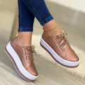 Stylish women's rose gold plateau sneakers with thick white soles and ribbon laces - 35 / Rose Gold