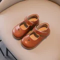 Classic brown Mary Jane style leather shoes for toddler girls featuring heart cutouts - 21 / Brown