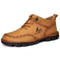 Detailed side view of brown leather men's outdoor casual boots with handmade stitching - 38 / Tan