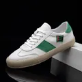 Baskets décontractées en cuir blanc pour hommes avec accents en daim vert et semelle beige - 38 / Blanc Vert