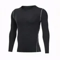 Detail view of men's thermal compression shirt with fleece lining for winter sports - S / Tops / Black Basic (1021)