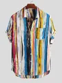 Macro shot of colorful vertical stripes on casual short-sleeve beach shirt. - Light Blue