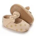 Macro detail of beige baby girl soft-sole walking shoes with star patterns and cute bow - Star Print Rubber Sole (D79)