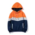 Detailed view of three-color blocked hoodie with orange, grey, and navy blue sections. - Orange Red