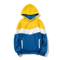 Detailed front view of this vibrant yellow, white, and blue color-block casual hoodie. - S / Tops / Yellow