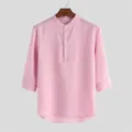 Vista dettagliata della camicia rosa da uomo con maniche a 3/4 e collo alla coreana. - Taglia S / Top / Rosa