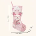 Grande calza di Natale rosa con paillettes, decoro renna e dimensioni indicate - Modello alce