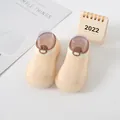 Detailed view of breathable beige baby sock shoes with flexible anti-slip rubber soles. - Beige (Coffee Cuff)
