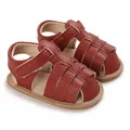 Close-up of brown textured leather baby sandals with soft soles and velcro strap - Inner Length 11cm / Brown