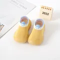 Detailed macro view of yellow knit baby walker sock shoes with anti-slip rubber soles - Size 18/19 (Internal Length 11.5cm) / Yellow (Blue Cuff)