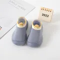 Close-up of grey knit baby walking shoes with anti-slip soles on a minimalist white surface - Size 18/19 (Internal Length 11.5cm) / Blue (Yellow Cuff)