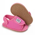 Detail view of pink baby sandals with breathable mesh and anti-slip pebble-pattern sole - Rose Red