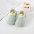 Detailed macro view of mint green baby sock shoes with breathable knit and soft soles - Green (Yellow Cuff)