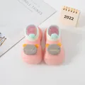Close-up of the knitted fabric and cute bear decoration on these pink baby pre-walker shoes - Pink (Bear & Letters)