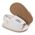 Detail view of white breathable mesh baby shoes with soft non-slip rubber soles - White