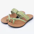 Stylish women's flat beach sandals featuring green braided leather straps and brown footbed - 35 / Green