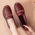 Burgundy soft sole leather loafers for women with perforated detail and gold trim. - 38 / Hollow Red