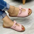 Bequeme rosa flache Sandalen für Damen mit einer stilvollen Schleife und Hohl-Design - Rosa