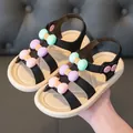 Close-up of girl's summer sandals featuring colorful pastel 3D bow decorations - 24 / Black