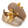 Close-up detail of gold glitter baby princess shoes showing non-slip soft rubber sole - Inner Length 11cm / Gold