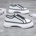 Sneaker casual da uomo in bianco e nero con suola morbida a cuscinetto d'aria - 38 / bianco e nero