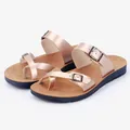 Elegant women's rose gold metallic flat sandals with breathable footbed and buckles - 35 / Champagne