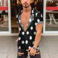 Detailed view of men's casual Hawaii shirt featuring a bold white polka dot print design - S / Tops / Black