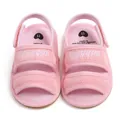 Close-up of pink breathable mesh baby sandals with soft soles and velcro straps - Pink