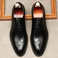 Draufsicht auf schwarze Herren-Business-Brogues aus Leder mit Flügelkappendetails - 35 / Schwarz
