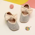 Detailed view of sparkling rhinestone baby girl princess shoes with large cream bows - Internal Length 11.5cm / Rhinestone Bowknot Style (23MBX710) / Beige