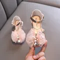 Elegantes zapatos de princesa para niña en oro rosa con lazo de tul y perlas de gala - Champán