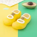 Detail view of yellow baby walking shoes featuring cute cat design and soft rubber sole - Size 18/19 (11.5cm Inner Length) / Yellow