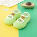 Close-up detail of lime green baby walker socks featuring soft rubber soles and cat patch - Size 22/23 (Inner Length 13.5cm) / Green