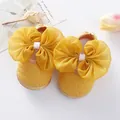 Close-up of yellow baby princess shoes with large organza bow and soft mesh fabric - Size 12 (Inner Length 11CM) / Yellow