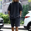Detail view of men's oversized terry cotton t-shirt and shorts set in washed grey - M / Top And Bottom / Navy Blue