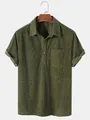 Dettaglio di polo da uomo in velluto a coste verde oliva a maniche corte con taschino sul petto - Taglia S / Top / Verde militare