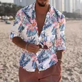 Detailansicht eines Herren-Langarmshirts mit tropischem Blumenmuster am Sonnenstrand - S / Oberteile / Tropischer Blumendruck