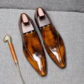 Elegant men's slip-on loafers in shiny burnished tan leather with classic seams - 36 / Tan