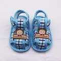 Close-up of blue plaid baby sandals with cute bear detail and soft sole - Size 11 (10.5CM) / Blue Checkered Style (LX006)