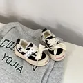 Detailed view of toddler canvas shoes with oversized bow laces and frayed edges - Size 30 (Internal Length 19.5cm) / Black