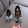 Elegant girl's princess dress shoes featuring black sequins and a large sparkly bow. - 21 / Black
