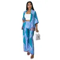 Full length studio shot showing the drape and pattern of the printed two-piece set. - Blue Stripe