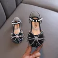 Elegant black girls' princess shoes featuring a large rhinestone bow and pearl ankle strap - 21 / Princess Shoe Style (858-Netting) / Black