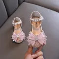 Sparkly pink girls' princess shoes featuring an elegant bow and pearl ankle strap details. - 21 / Princess Shoe Style (858-Netting) / Pink
