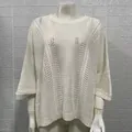 Detail view of a white loose-fit mesh knit hollow-out beach bikini cover-up top - White