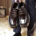 Close-up of dark brown men's handmade square-toe business casual leather dress shoes - 38 / Maroon (A3291)