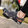 Grey and orange outdoor wading shoes for cycling shown on a bicycle pedal lifestyle view - 36 / Dark Grey (A026)