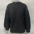 Close-up of black vertical ribbed knit texture on a cozy long-sleeve women's sweater - S / Tops / Black