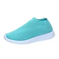 Breathable teal fly-knit slip-on sneaker with textured white flat sole for women - Lake Blue