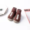 Brown knit baby sock shoes with soft rubber soles featuring self-care label design - 18/19 / Label Style / Brown